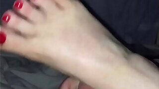 Wife’s sexy feet giving a great footjob,foot fetish,red toes,UK,British